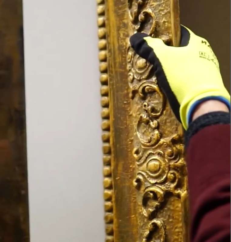 Holding Picture Frame